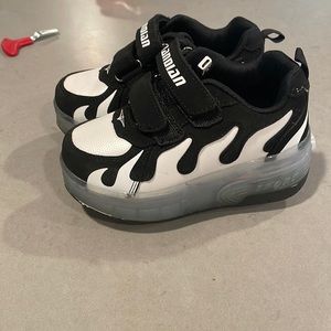 Jiandian light up Roller skates with removable wheels just like Heelys